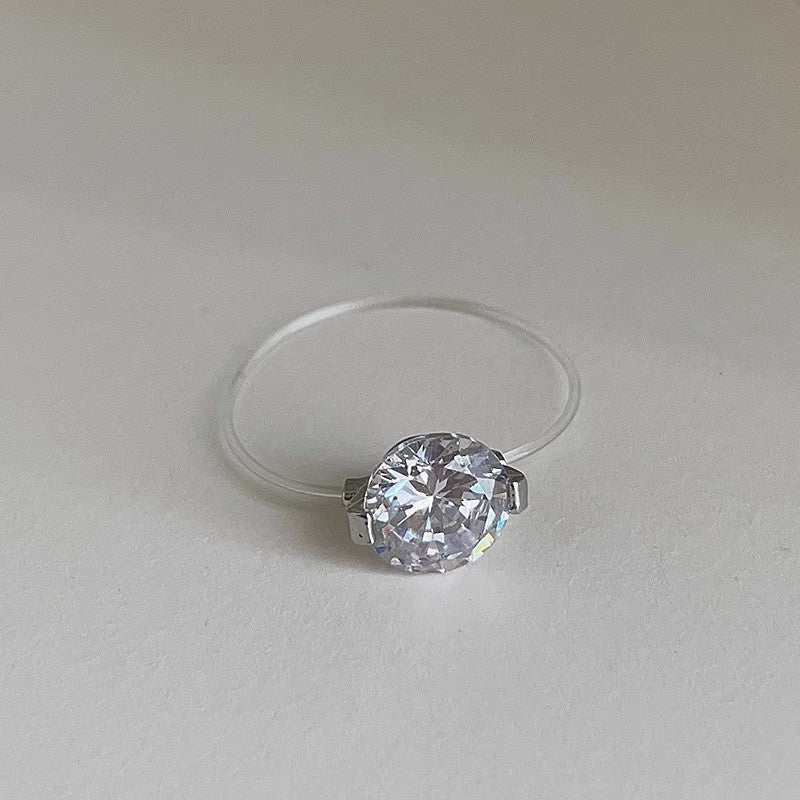 💎 The Invisible Elegance – #452 Ring ✨ Where minimalist design meets brilliant sparkle!